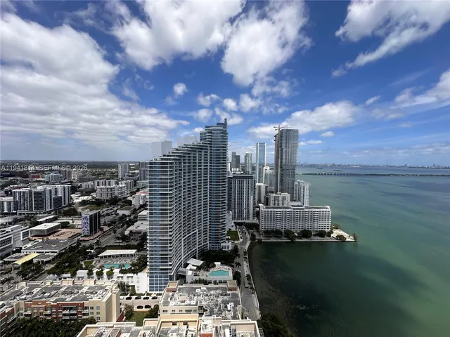 a view of a balcony with city