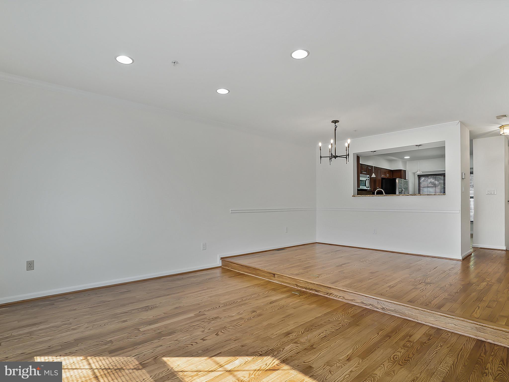 16820 Centerfield Way Olney, MD 20832 - Photo 17 of 48 Living Room looking into Dining Room and Kitchen