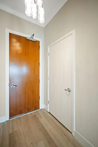 a view of an empty room with a window