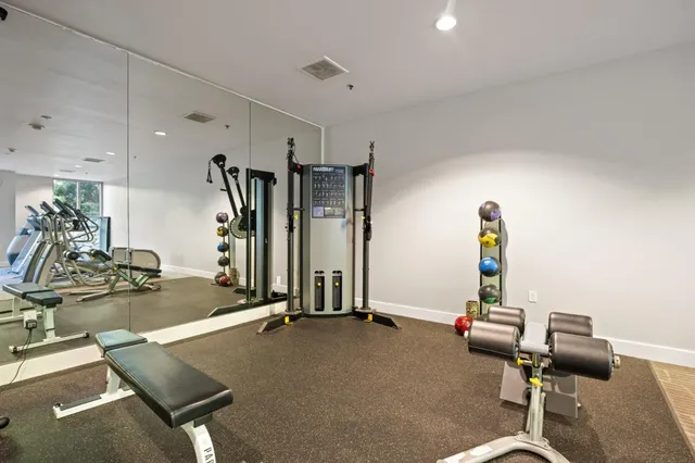a view of a room with gym equipment