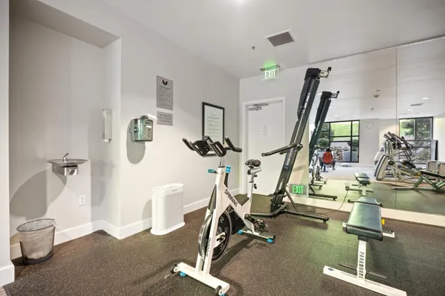 a view of a room with gym equipment