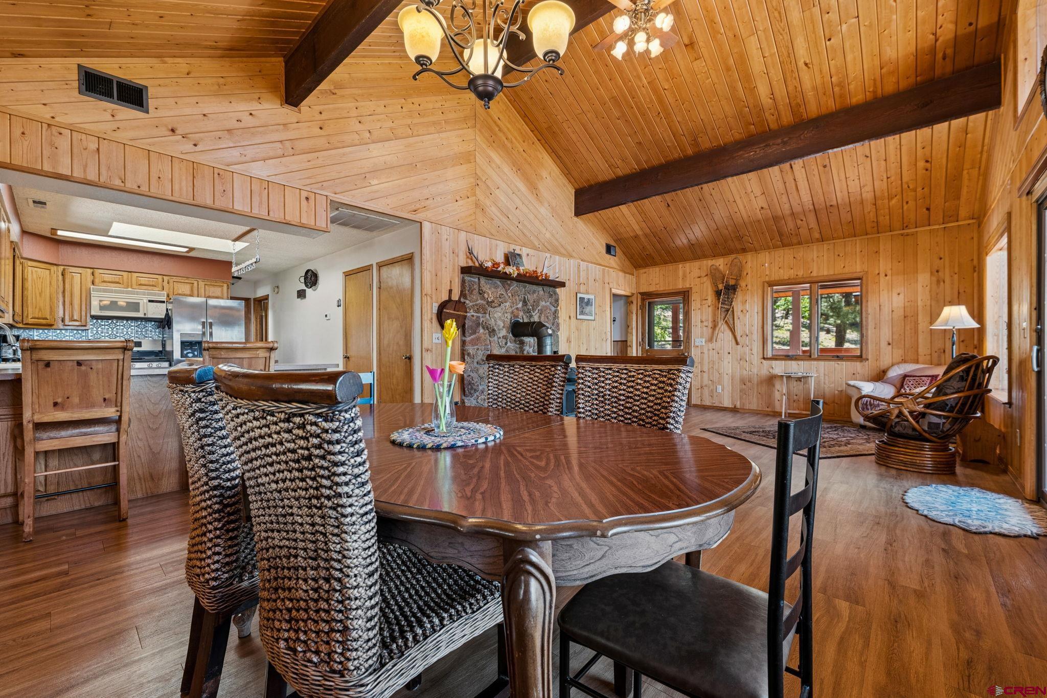 1024 Deer Ridge Drive Bayfield, CO 81122 - Photo 14 of 45 a dining room with furniture and wooden floor