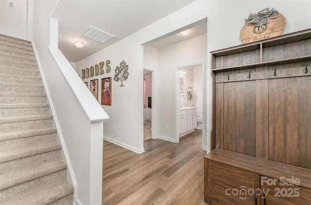 a view of entryway with wooden floor