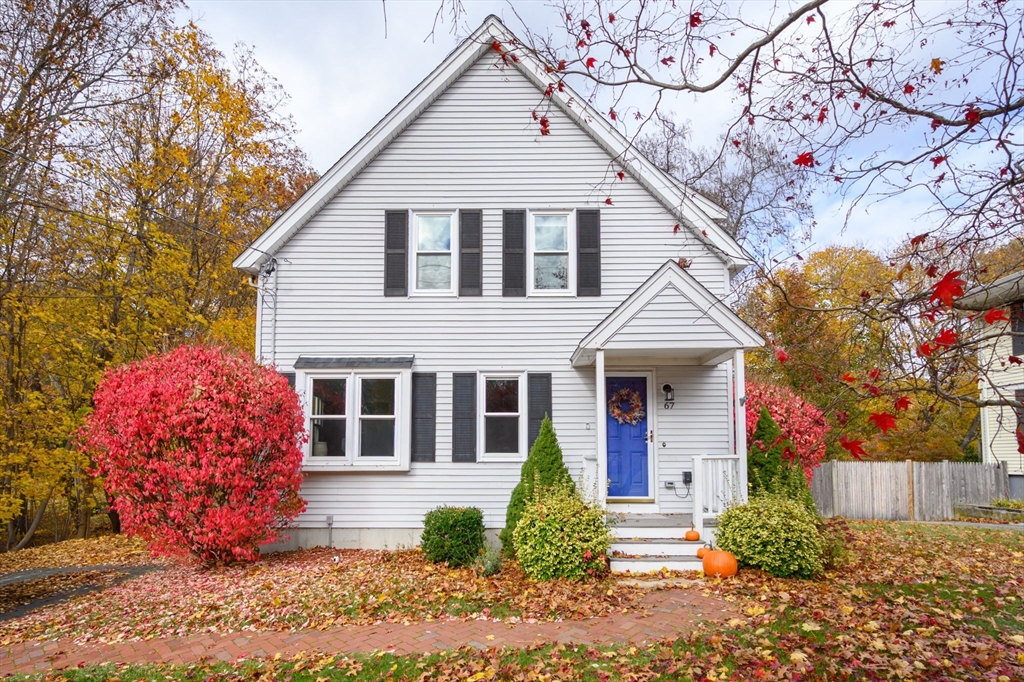 67 School Street Hanover, MA 02339 - Photo 2 of 29 a front view of a house with garden