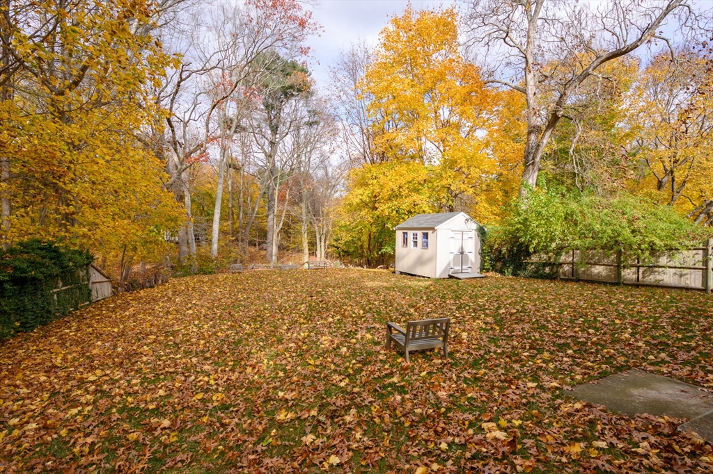67 School Street Hanover, MA 02339 - Photo 27 of 29 a street view with large trees