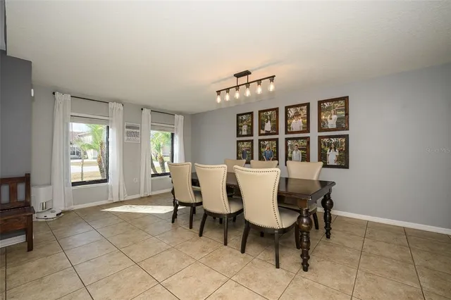 a kitchen with cabinets and window