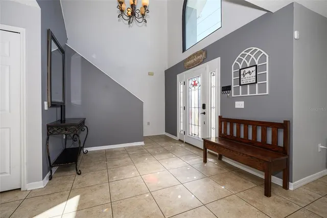 a kitchen with stainless steel appliances granite countertop a refrigerator and a stove