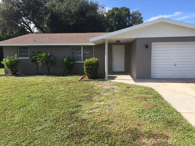 4119 Tarpon Road Venice, FL 34293 - Photo 1 of 1 a front view of a house with garden