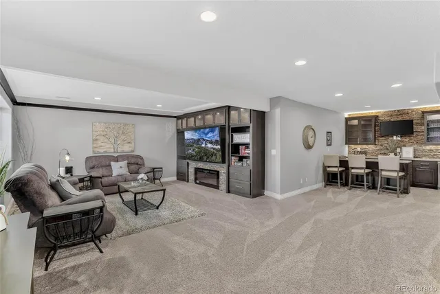 a living room with furniture and window
