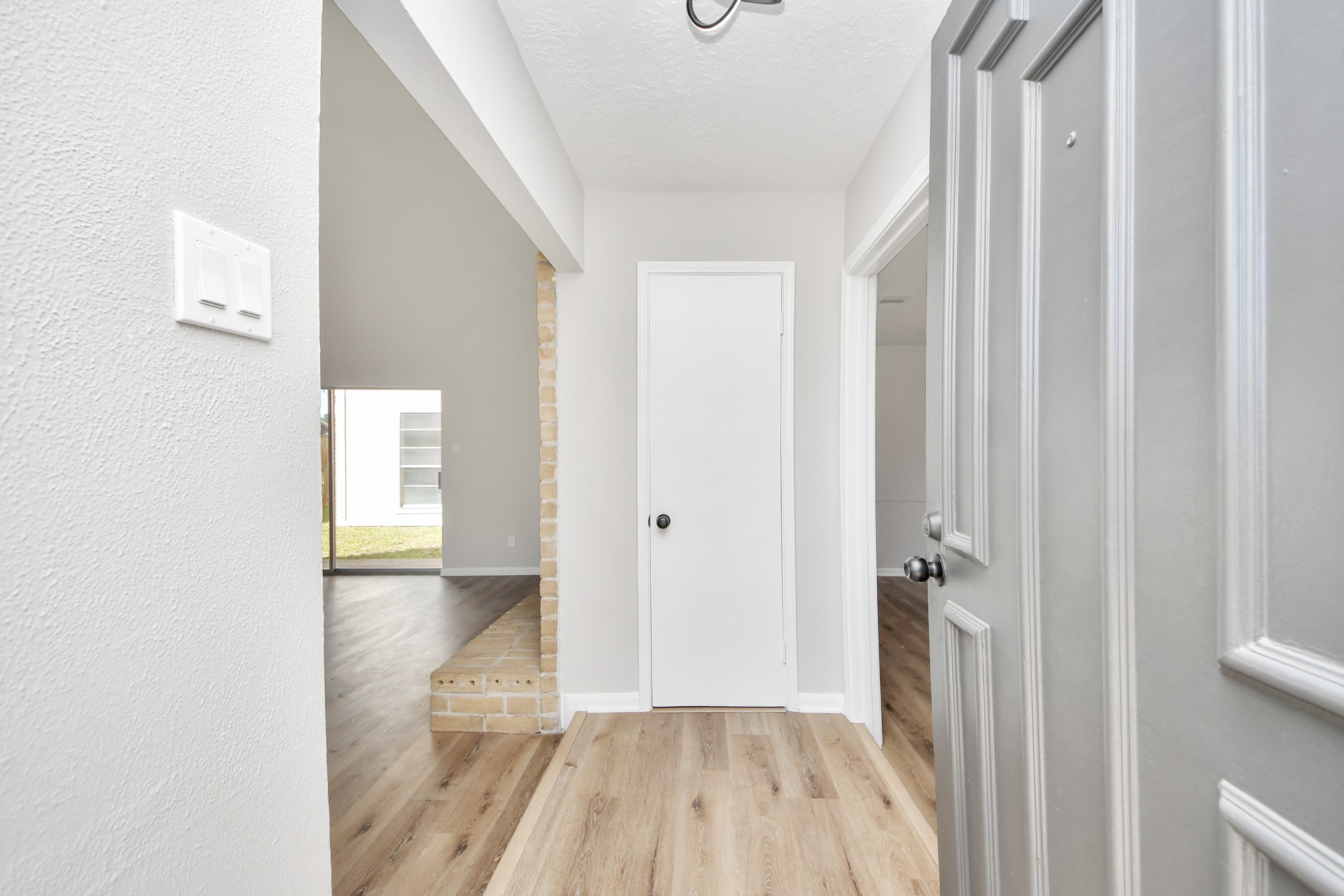 9114 Spellman Road Houston, TX 77031 - Photo 4 of 30 a view of a room with wooden floor and a bathroom