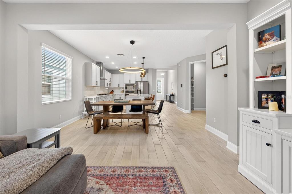 2139 Bay Line Road Oakland, FL 34787 - Photo 13 of 57 a living room with furniture and a book shelf