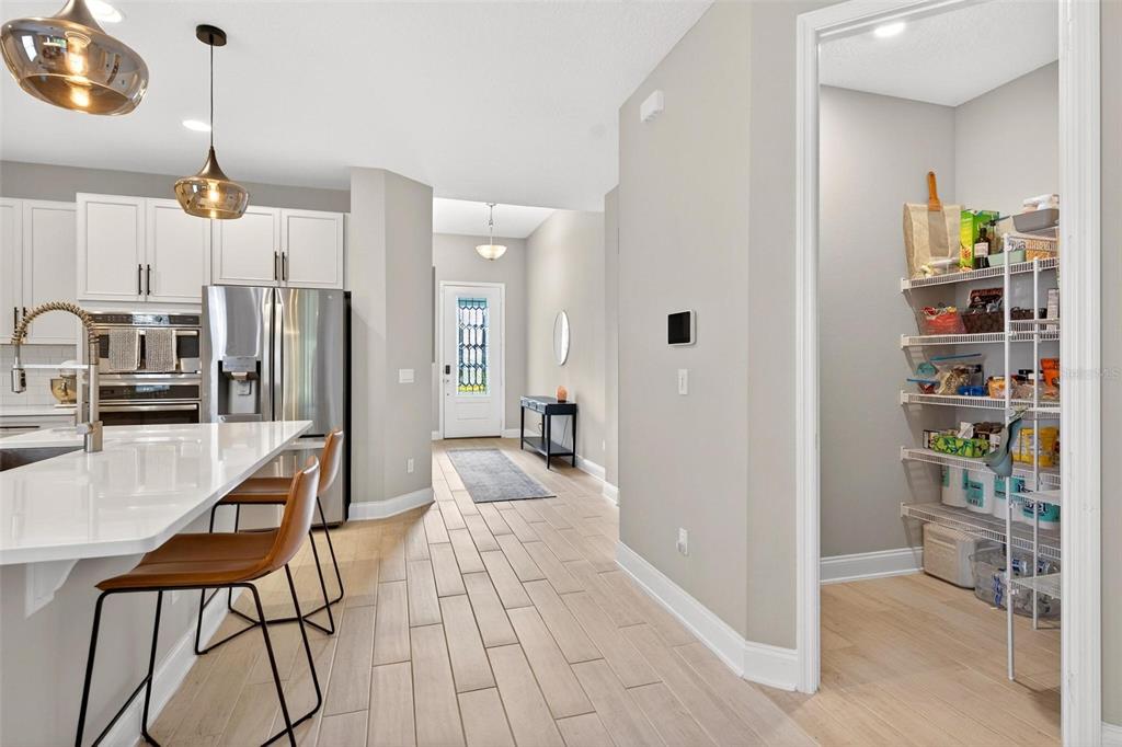 2139 Bay Line Road Oakland, FL 34787 - Photo 16 of 57 a view of a living room and kitchen