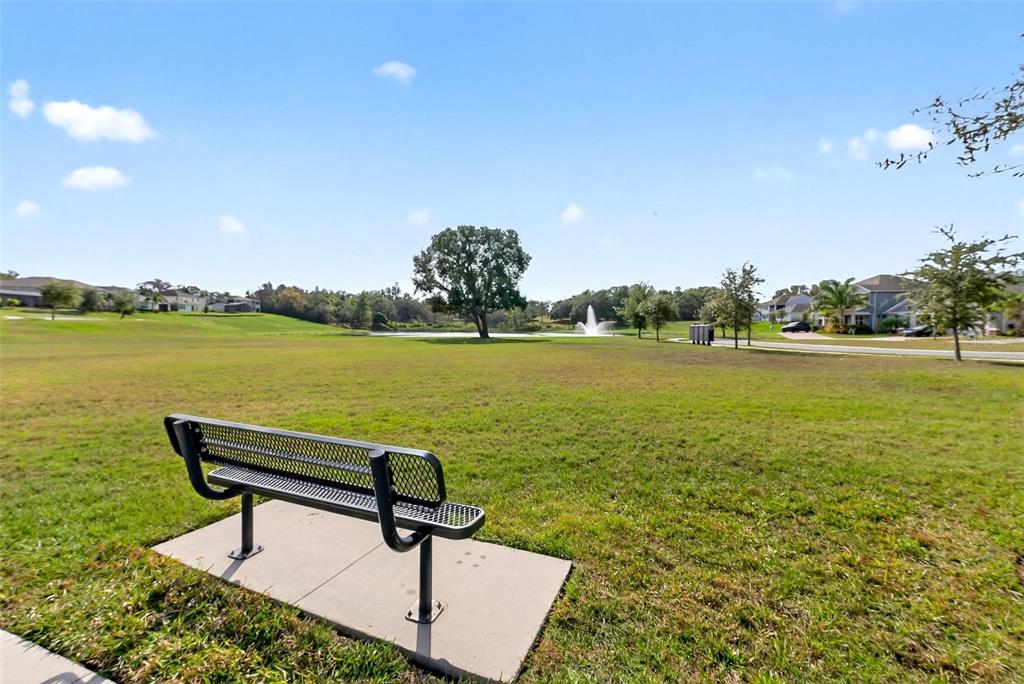 2139 Bay Line Road Oakland, FL 34787 - Photo 51 of 57 a view of a water with a table and chairs in the patio