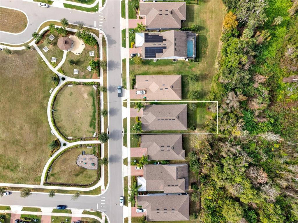 2139 Bay Line Road Oakland, FL 34787 - Photo 54 of 57 an aerial view of residential house with outdoor space and parking