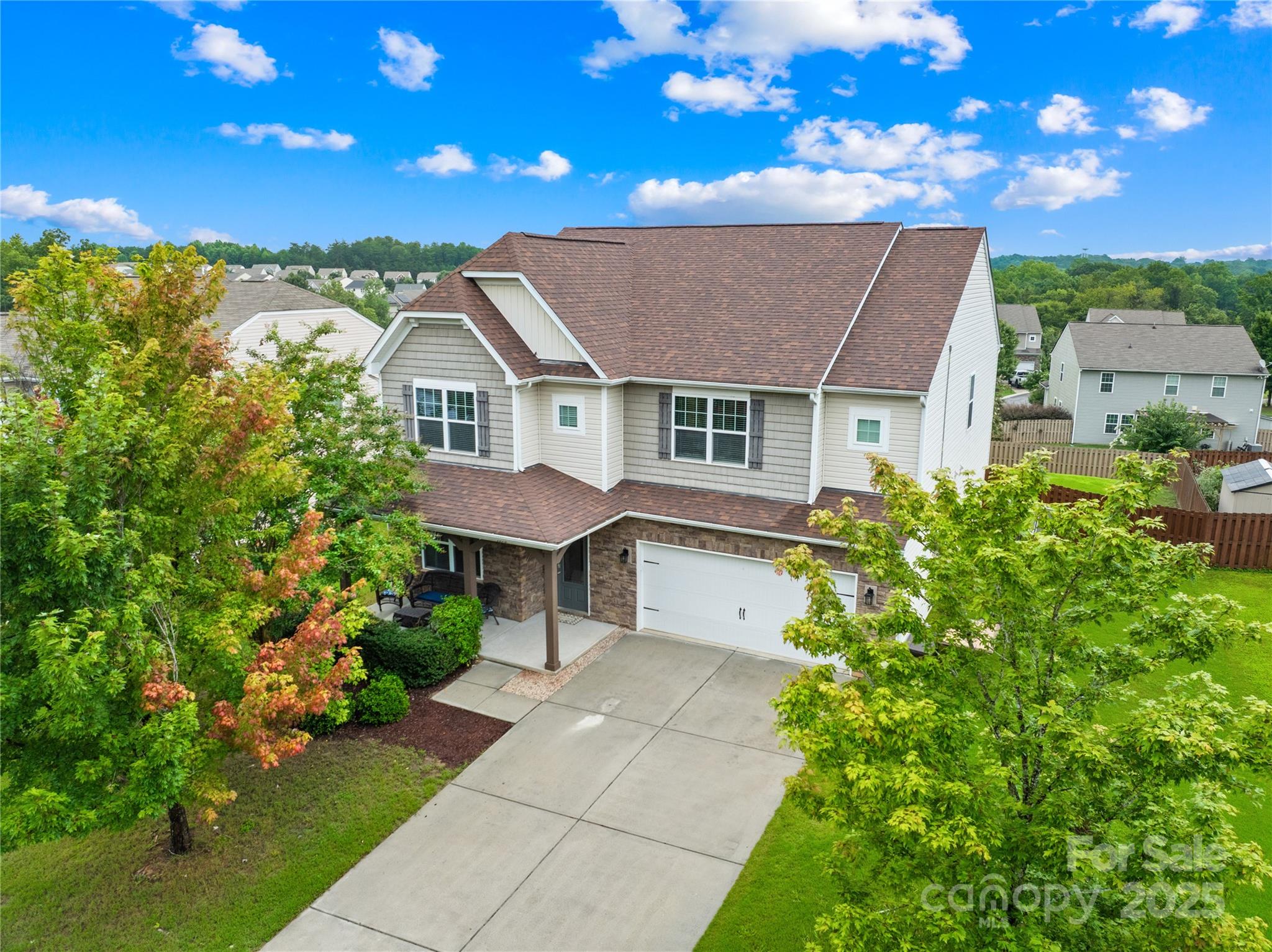 1858 Caprington Drive Fort Mill, SC 29707 - Photo 1 of 46 a house view with a garden space