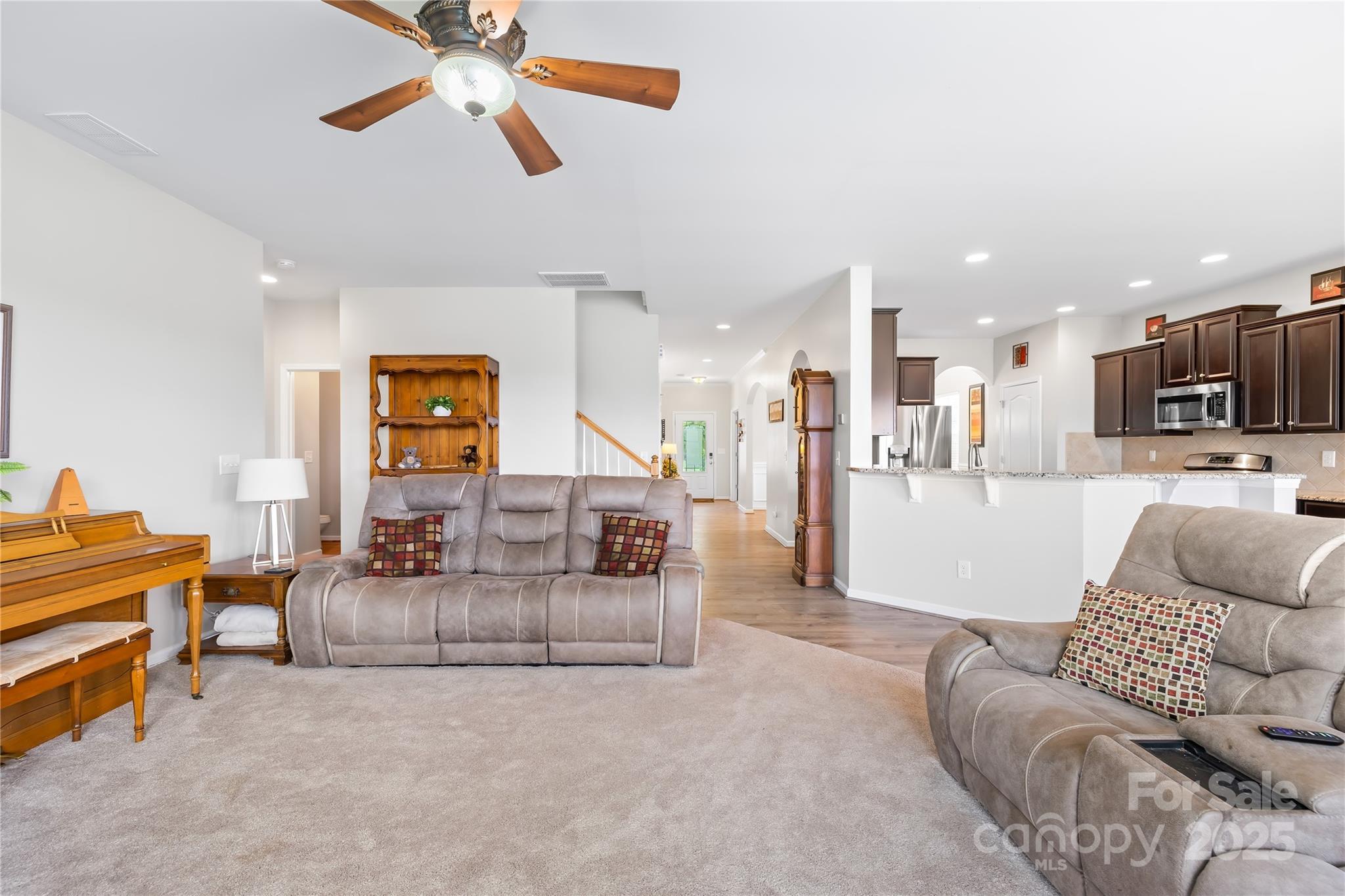 1858 Caprington Drive Fort Mill, SC 29707 - Photo 14 of 46 a living room with furniture and kitchen view
