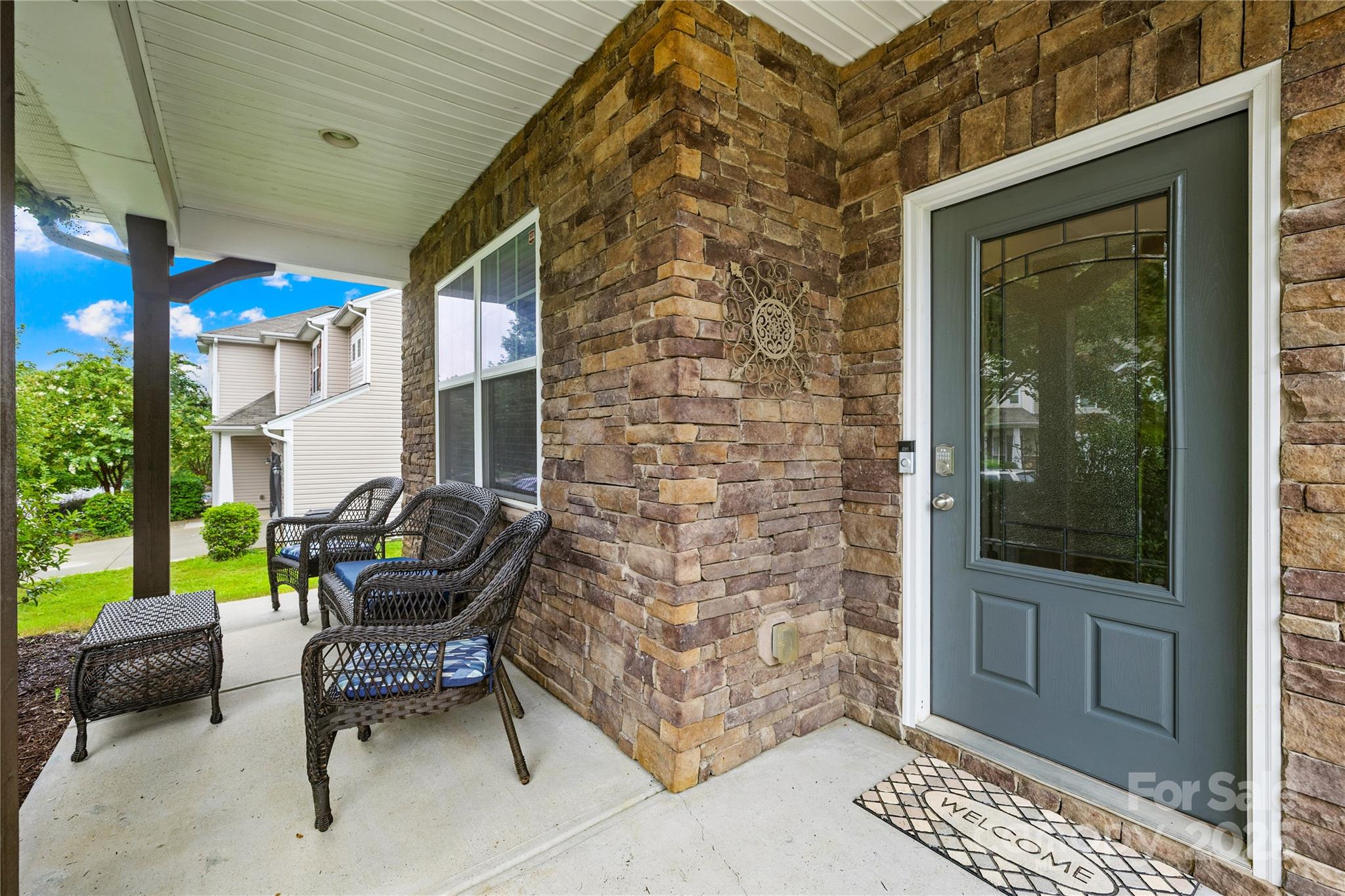 1858 Caprington Drive Fort Mill, SC 29707 - Photo 2 of 46 a backyard of a house with outdoor seating