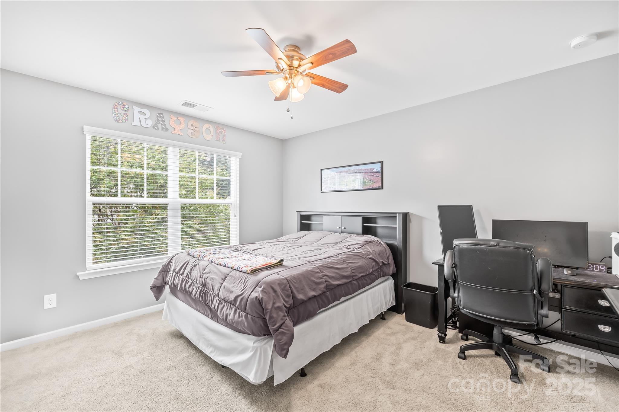 1858 Caprington Drive Fort Mill, SC 29707 - Photo 31 of 46 a bedroom with a bed and a desk