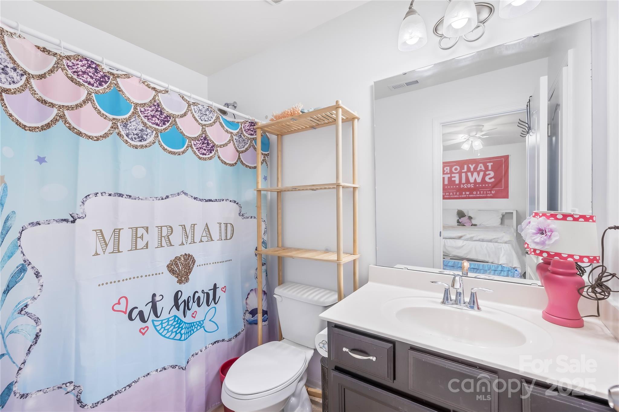 1858 Caprington Drive Fort Mill, SC 29707 - Photo 36 of 46 a bathroom with a sink a toilet and a mirror