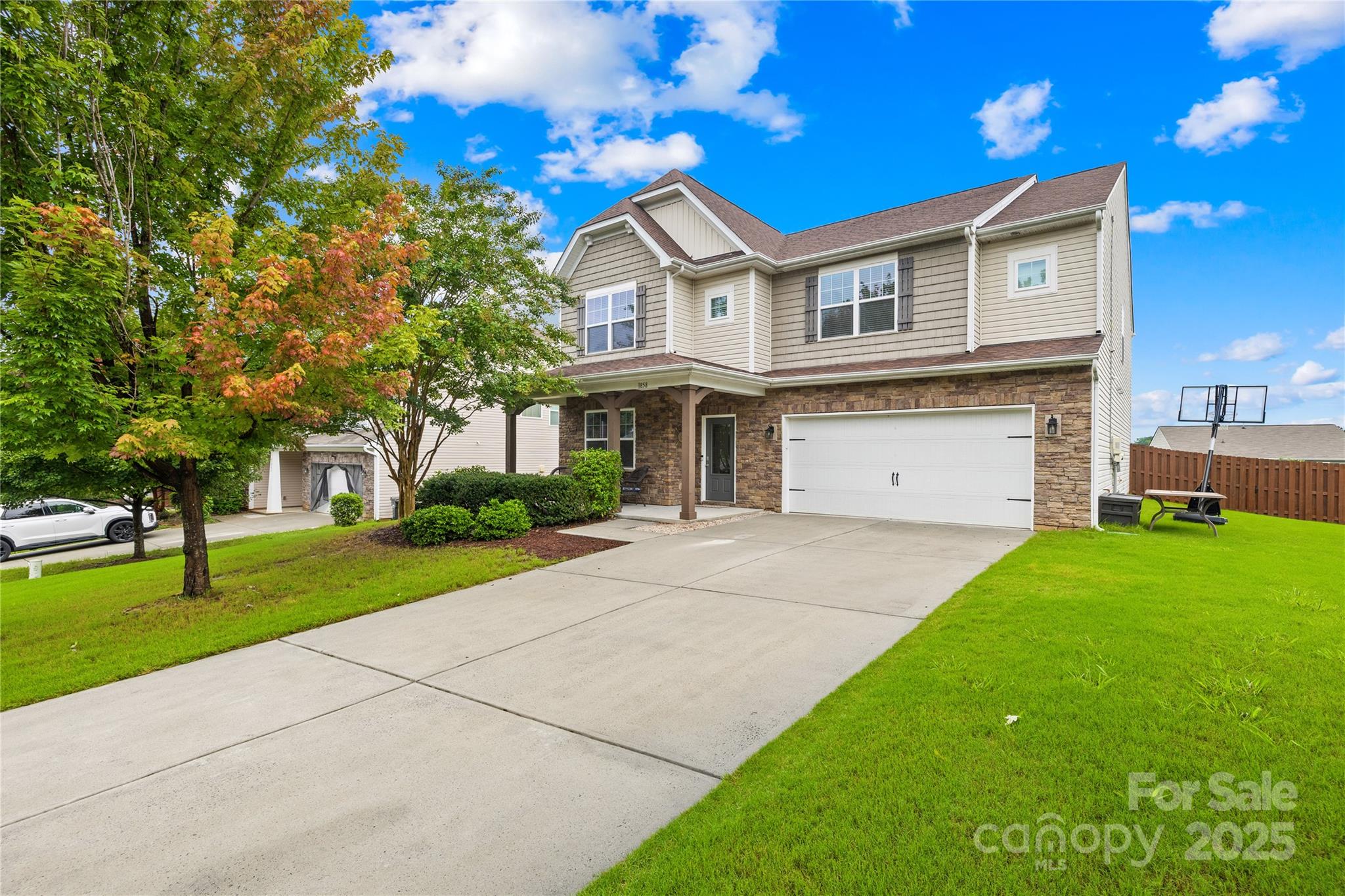 1858 Caprington Drive Fort Mill, SC 29707 - Photo 41 of 46 a front view of a house with a yard and garage
