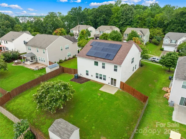 a aerial view of a house with garden