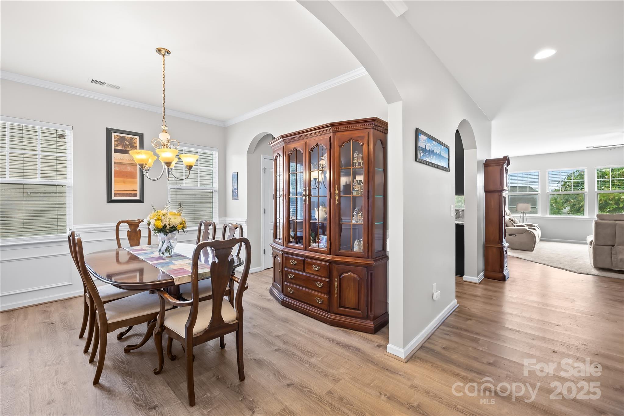 1858 Caprington Drive Fort Mill, SC 29707 - Photo 9 of 46 a view of a dining room with furniture window and wooden floor