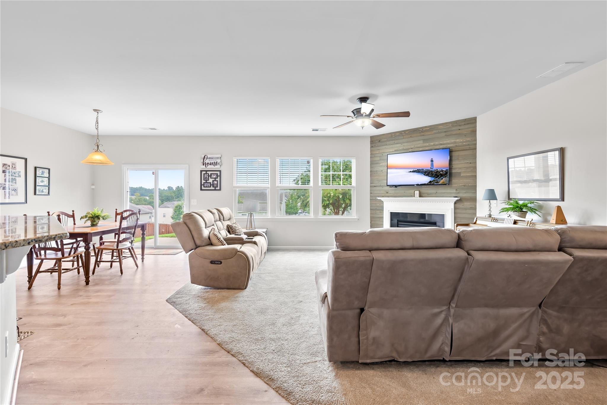 1858 Caprington Drive Fort Mill, SC 29707 - Photo 10 of 46 a living room with furniture and a flat screen tv
