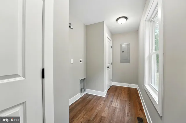 a view of wooden floor in an empty room