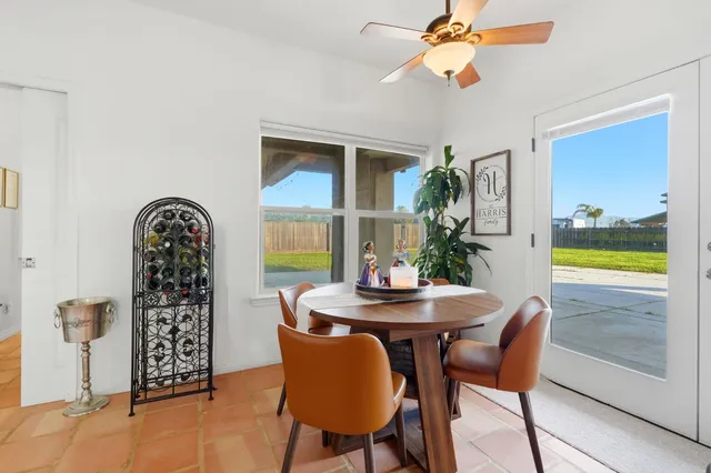 a utility room with sink dryer and washer