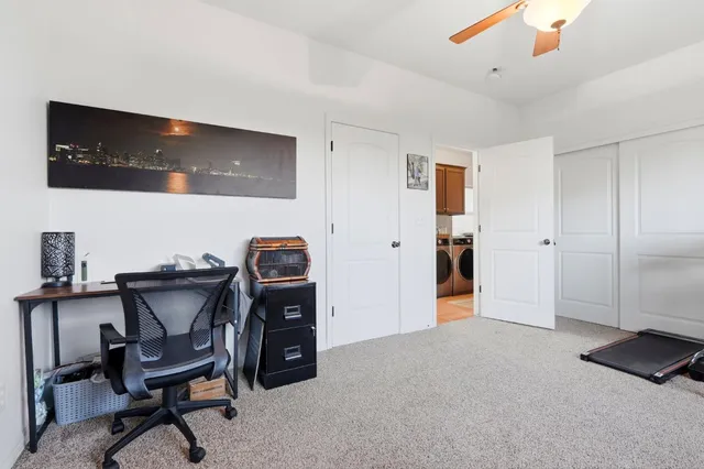 a bathroom with a granite countertop sink mirror and double