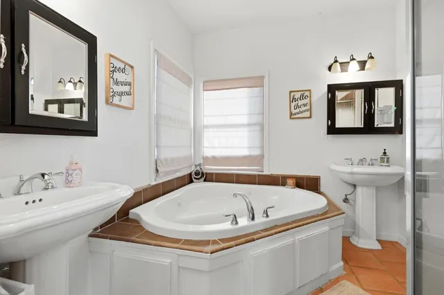 a view of a patio with swimming pool