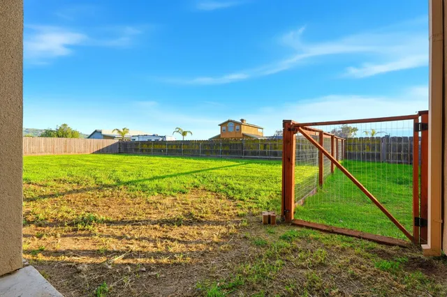 a house view with a outdoor space