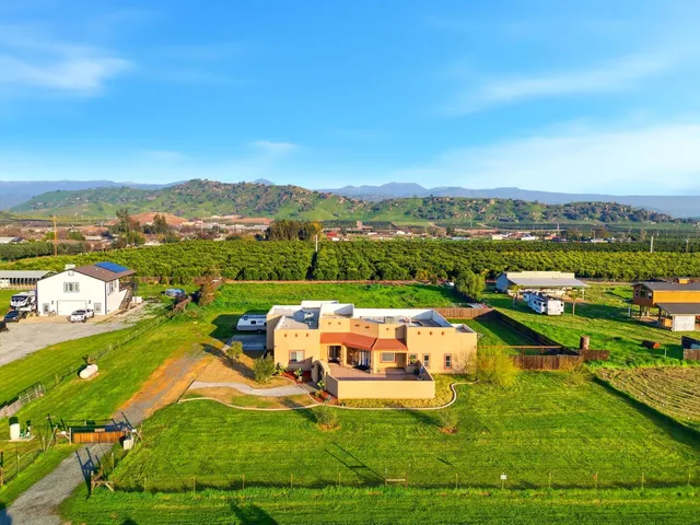 a view of a city with an ocean view