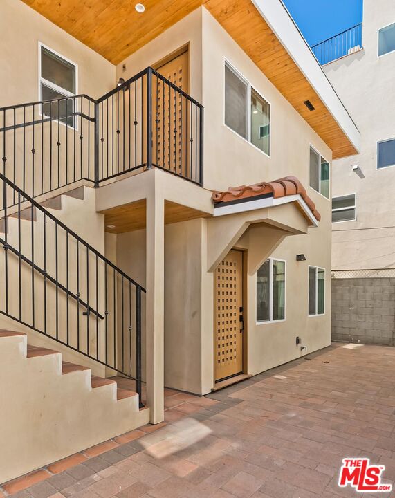 3431 Edgehill Drive Los Angeles, CA 90018 - Photo 11 of 17 a view of a white building