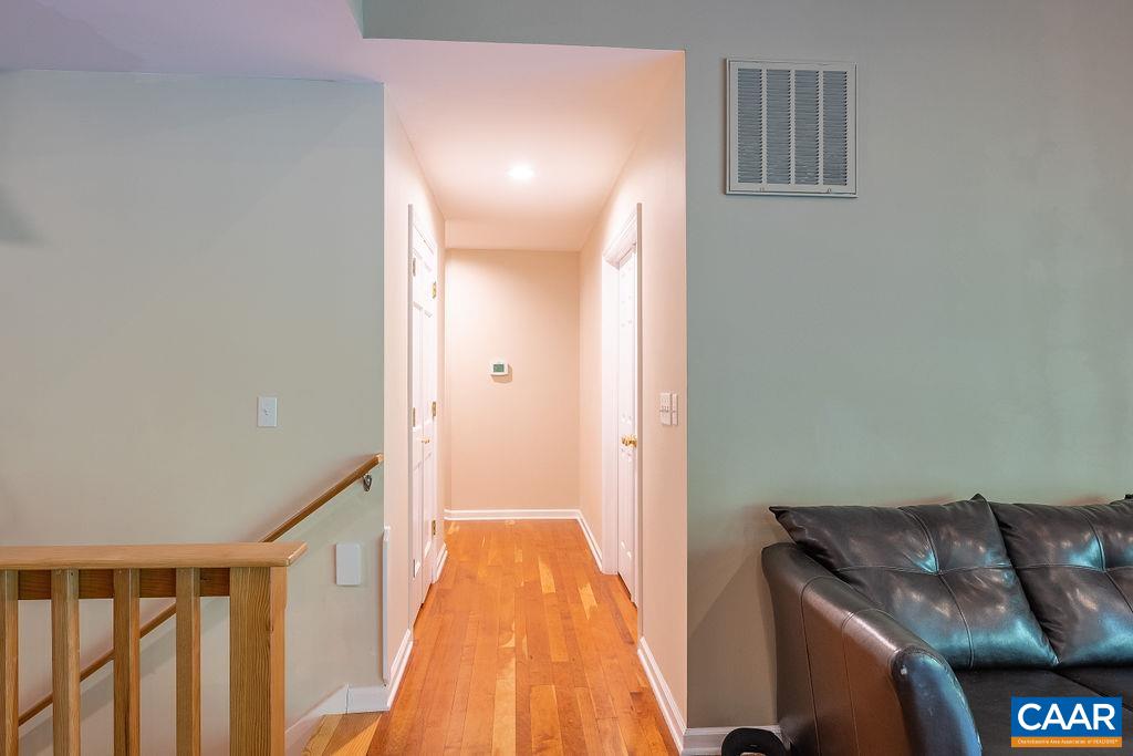 475 David Road Charlottesville, VA 22902 - Photo 14 of 38 a living room with furniture and a wooden floor