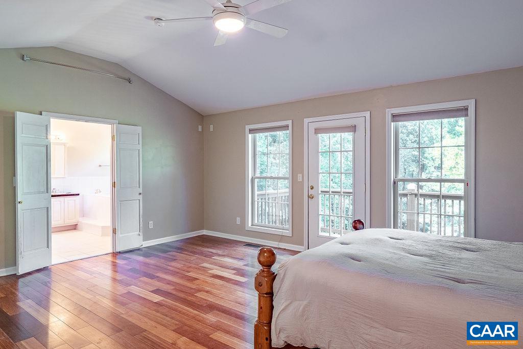 475 David Road Charlottesville, VA 22902 - Photo 16 of 38 a bedroom with a bed and a window