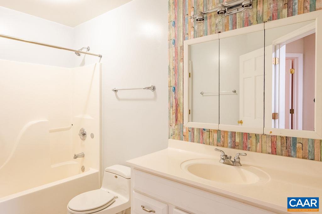 475 David Road Charlottesville, VA 22902 - Photo 22 of 38 a bathroom with a sink toilet and shower
