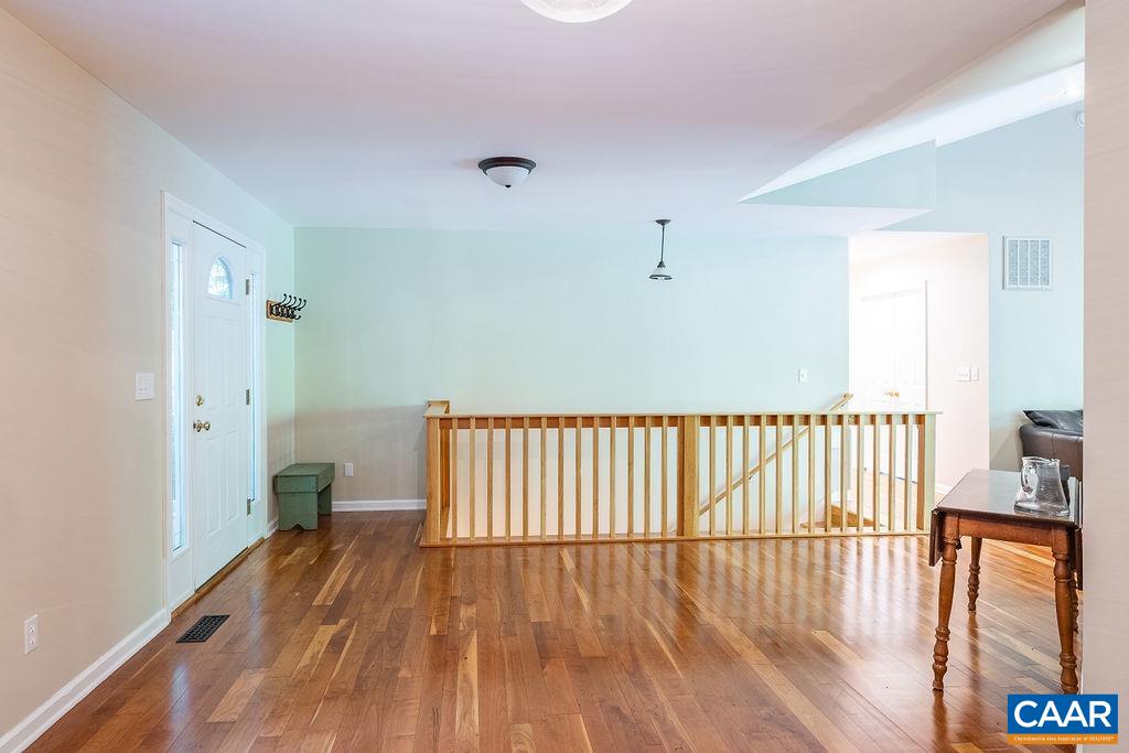 475 David Road Charlottesville, VA 22902 - Photo 7 of 38 a view of a hallway with wooden floor