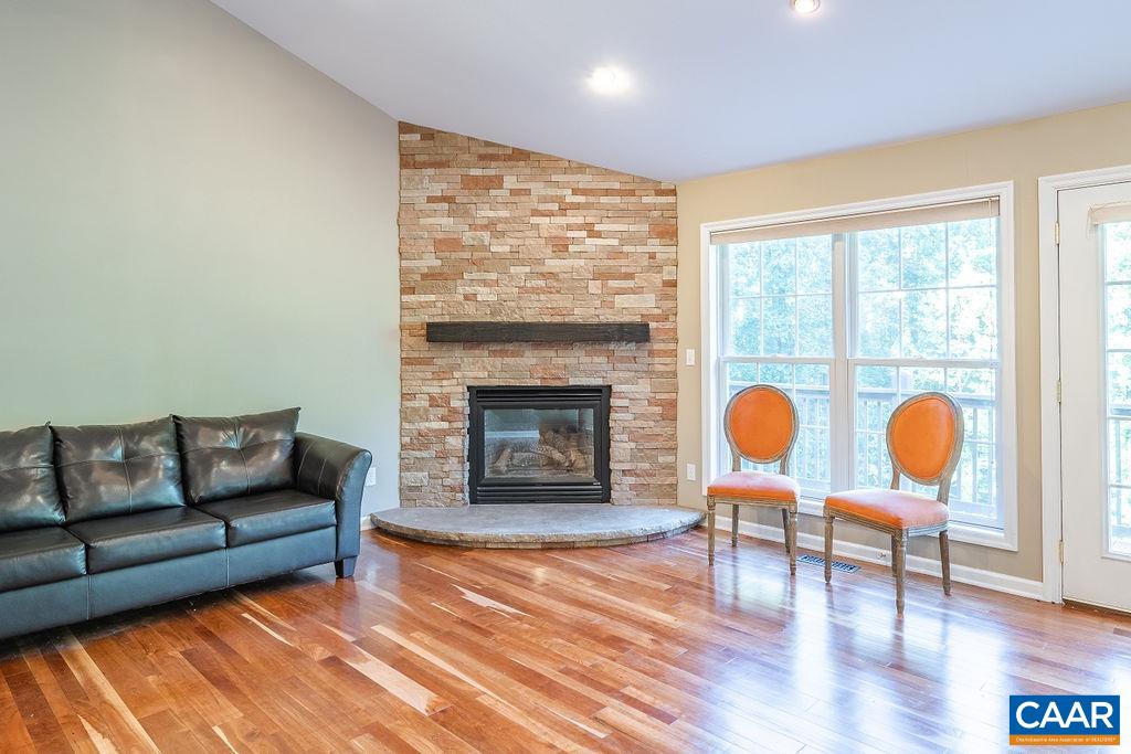 475 David Road Charlottesville, VA 22902 - Photo 10 of 38 a living room with furniture and a fireplace