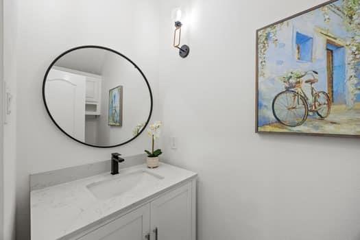 4147 Rench Road Fort Worth, TX 76135 - Photo 15 of 30 a bathroom with a sink and a mirror