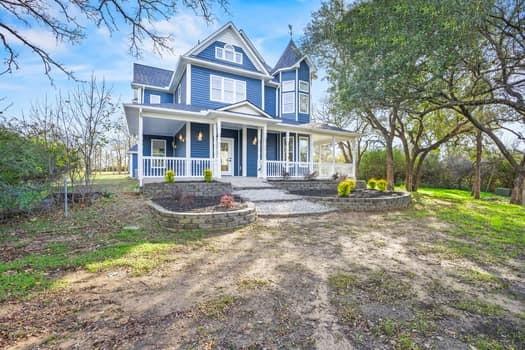 4147 Rench Road Fort Worth, TX 76135 - Photo 2 of 30 a front view of a house with a yard