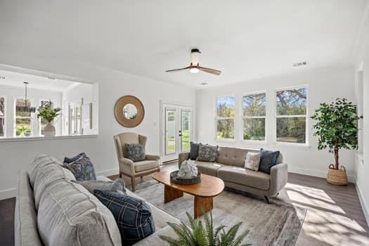 4147 Rench Road Fort Worth, TX 76135 - Photo 10 of 30 a living room with furniture a rug potted plant and a window