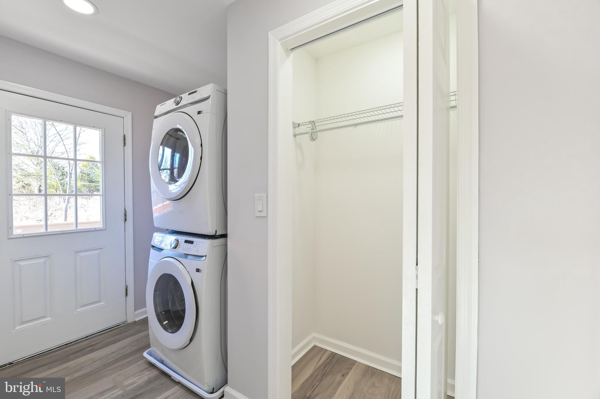 6716 Johnnycake Road Catonsville, MD 21228 - Photo 16 of 23 a utility room with dryer and washer