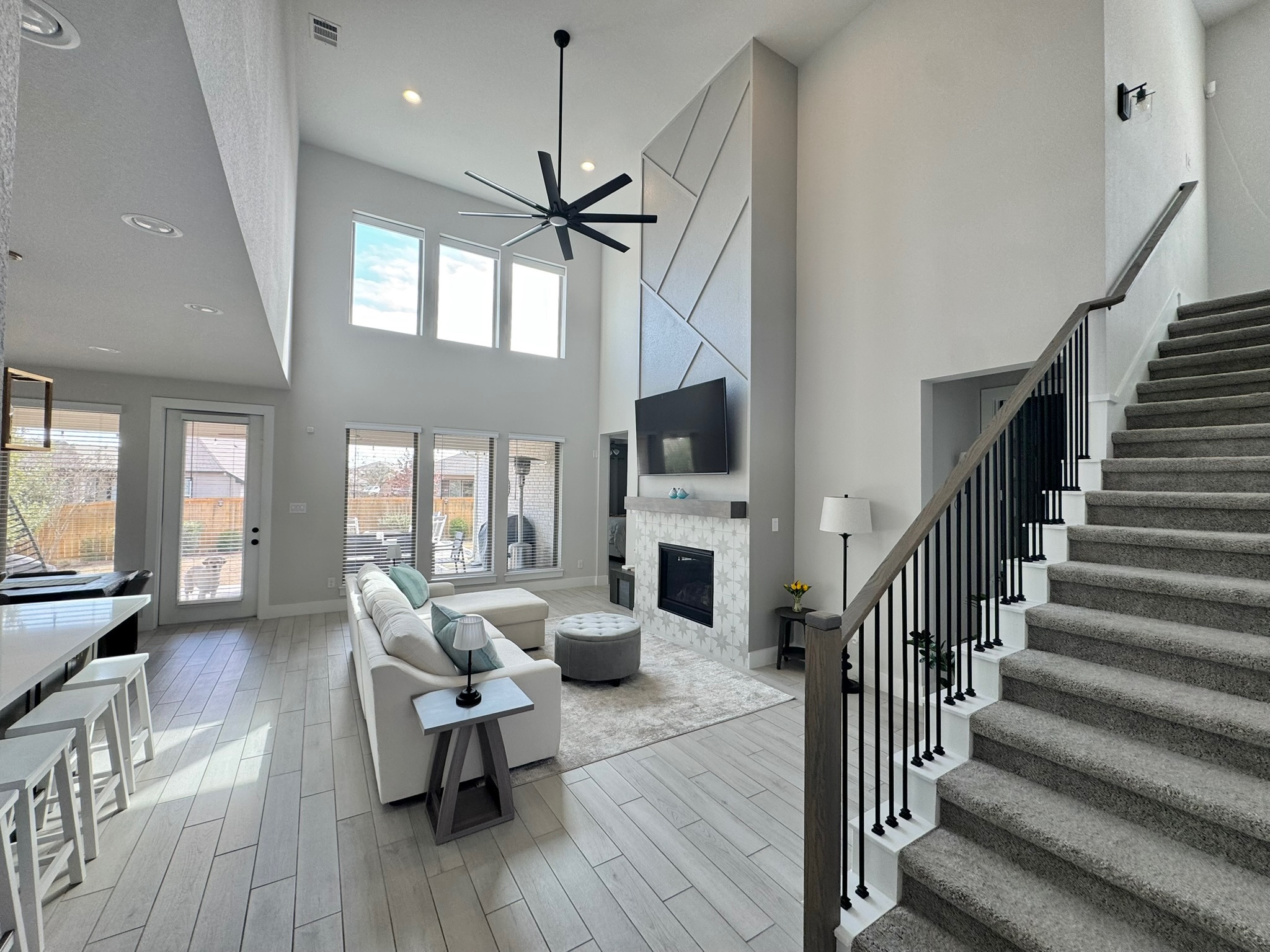 561 Cold Riv Run Kyle, TX 78640 - Photo 3 of 33 a living room with fireplace furniture and a wooden floor