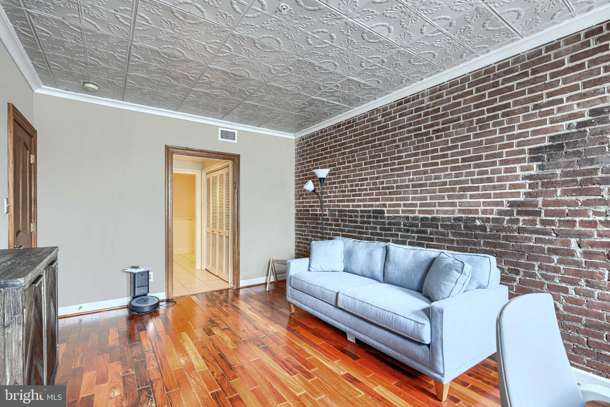 1000 Fell Street, Unit 606 Baltimore, MD 21231 - Photo 22 of 56 Charming space with exposed brick walls.