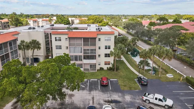 an aerial view of a house with a garden
