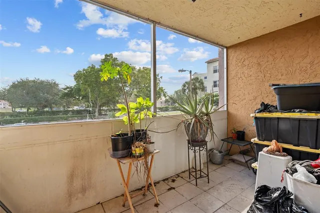 a view of a workspace with furniture