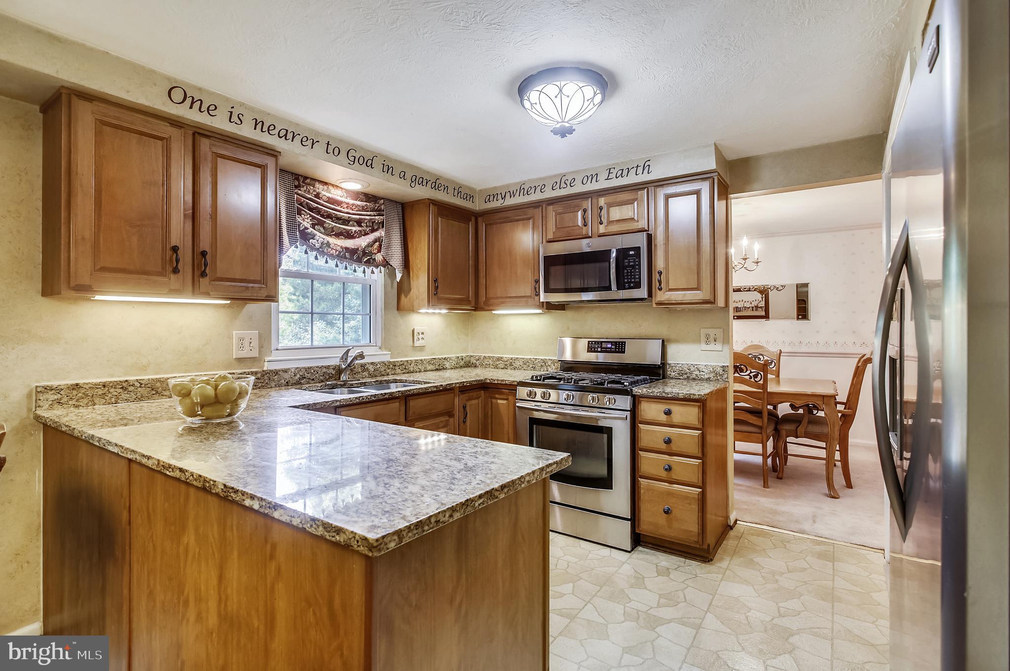 29 Highfields Drive Baltimore, MD 21228 - Photo 8 of 50 Kitchen with stainless steel appliances