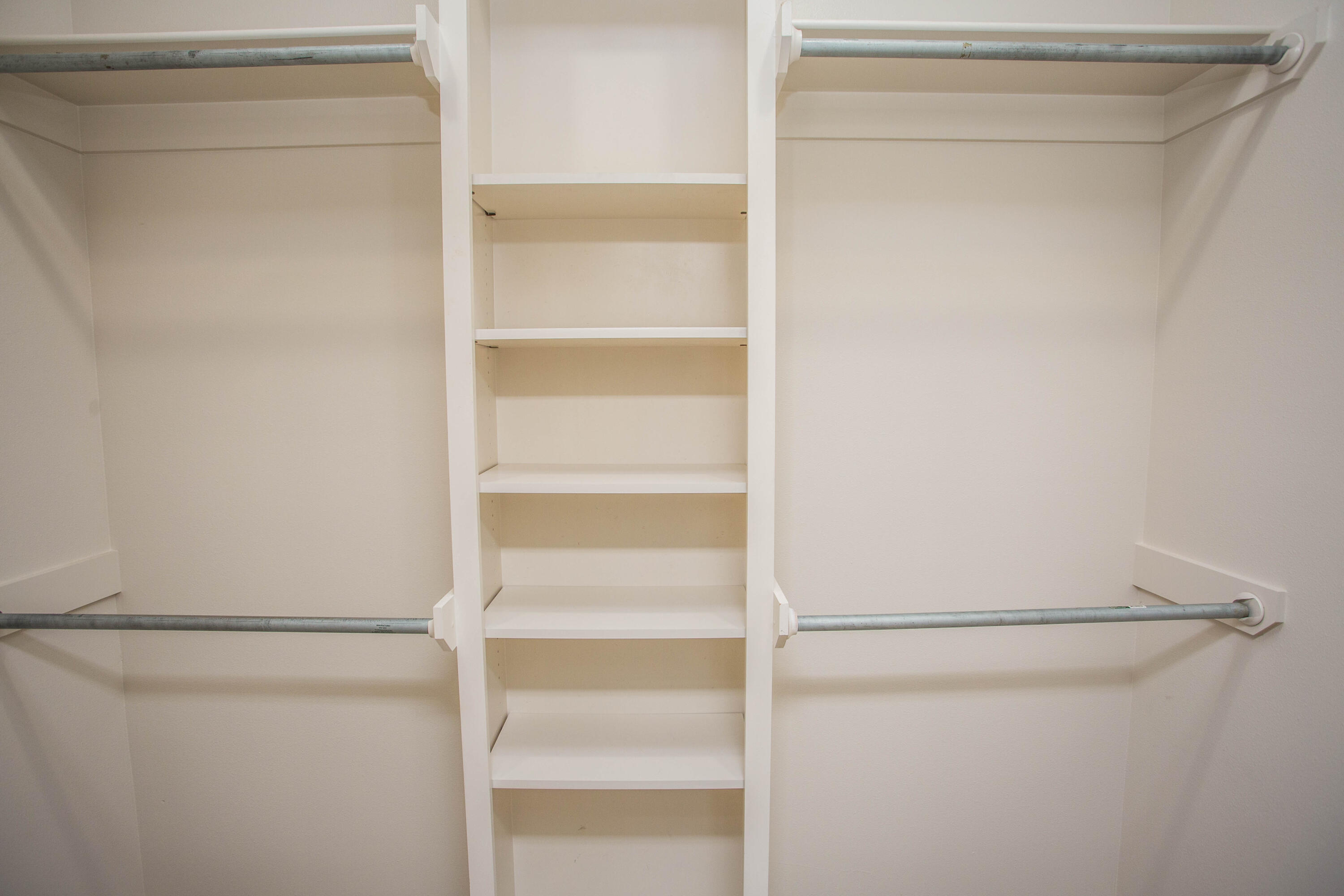 5613 Kemper Street Lubbock, TX 79416 - Photo 14 of 35 a view of an empty walk in closet