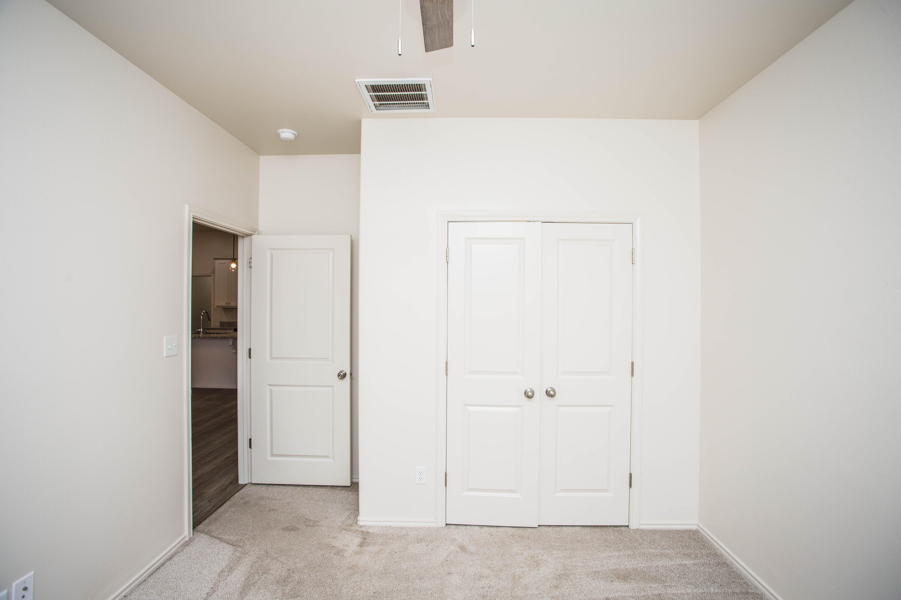 5613 Kemper Street Lubbock, TX 79416 - Photo 17 of 35 an empty room with closet